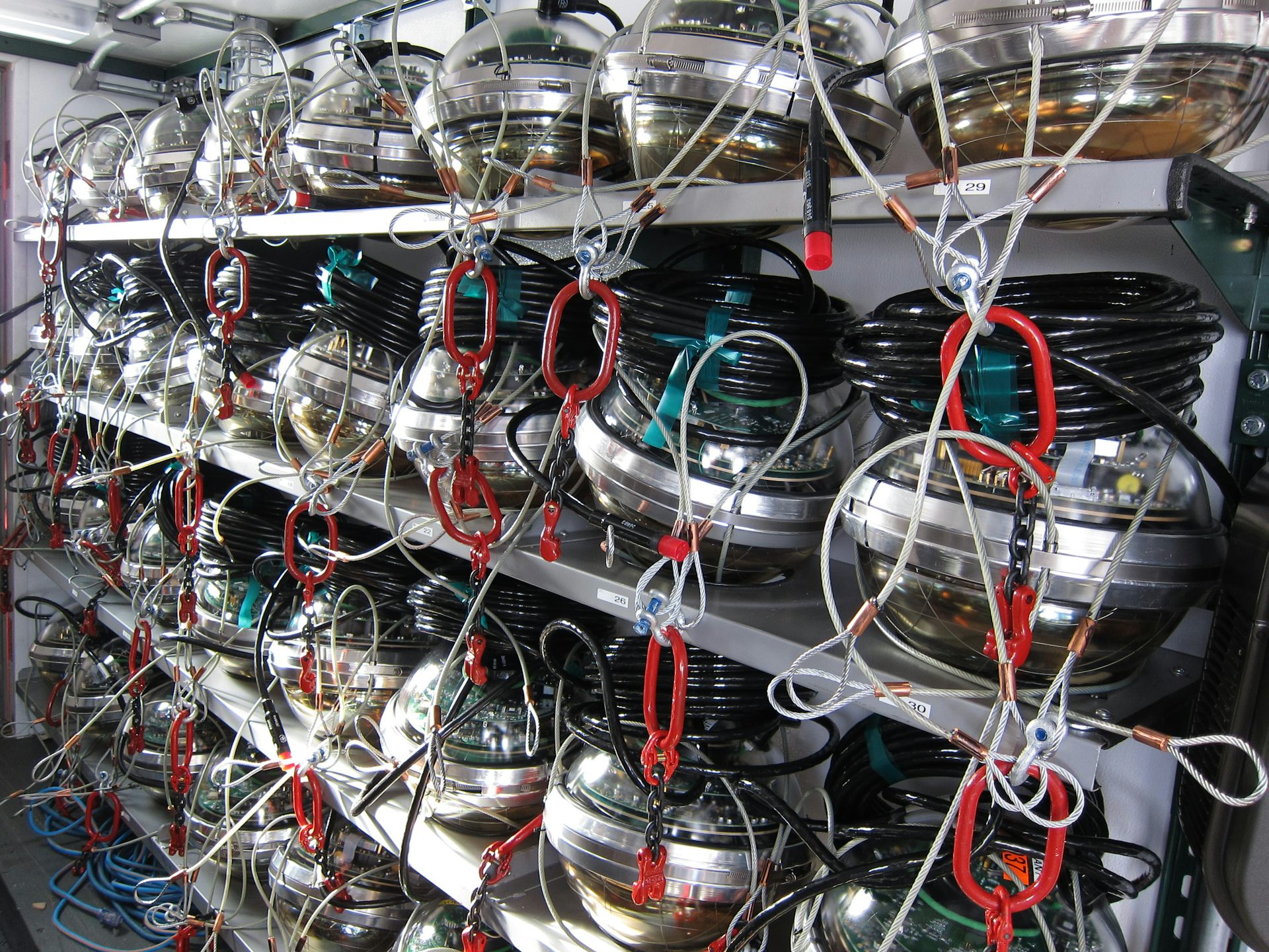 A unit of shelving containing rows of circular sensor modules.